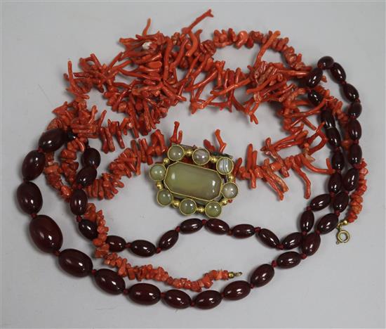 A simulated cherry amber necklace, a freeform coral necklace and an agate set clasp.